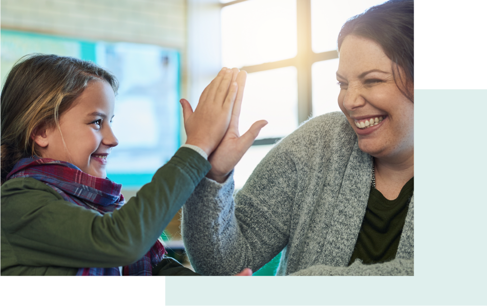 Photo of a girl and a woman high-fiving